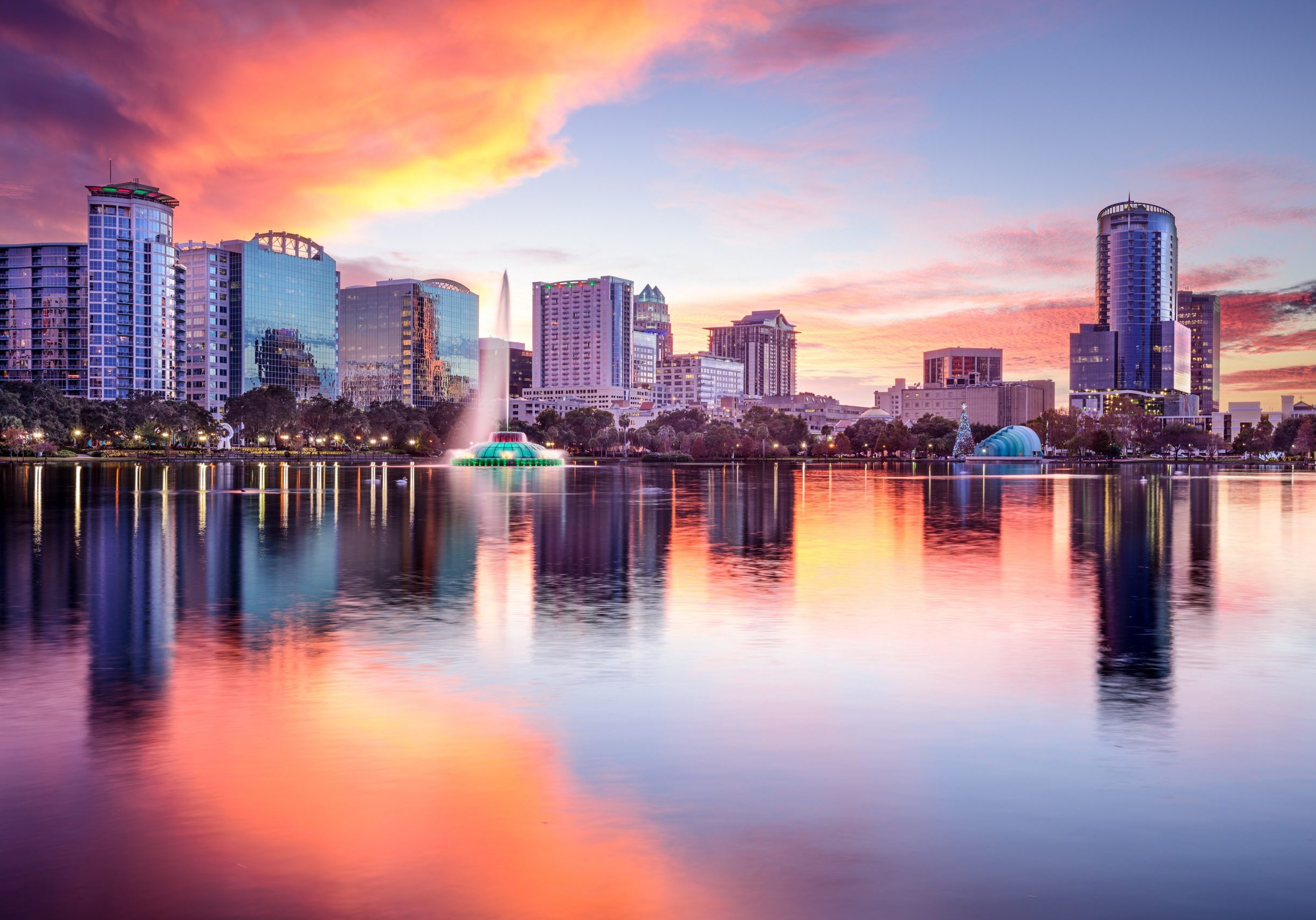 Orlando, Florida, USA downtown city skyline from Eola Park.